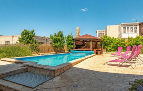 Beautiful home in Rogoznica with Outdoor swimming pool, Jacuzzi and 8 Bedrooms